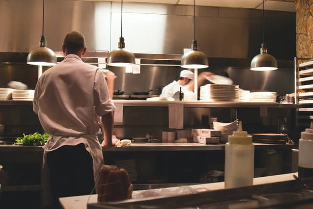 Mar de Luna Dénia chef standing in restaurant kitchen